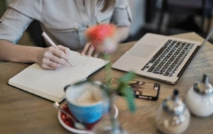 top-best-webdisigner-expert-in-kasaragod a girl writing note